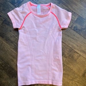 girls light pink ivivva athletic tee
